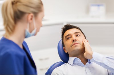 young man getting dental treatment